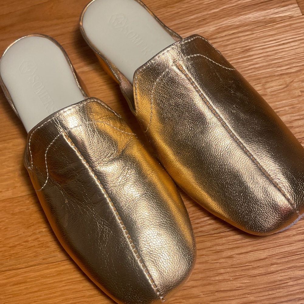 Gold leather “Somersby” wedge heel slippers. Never worn. Size 6